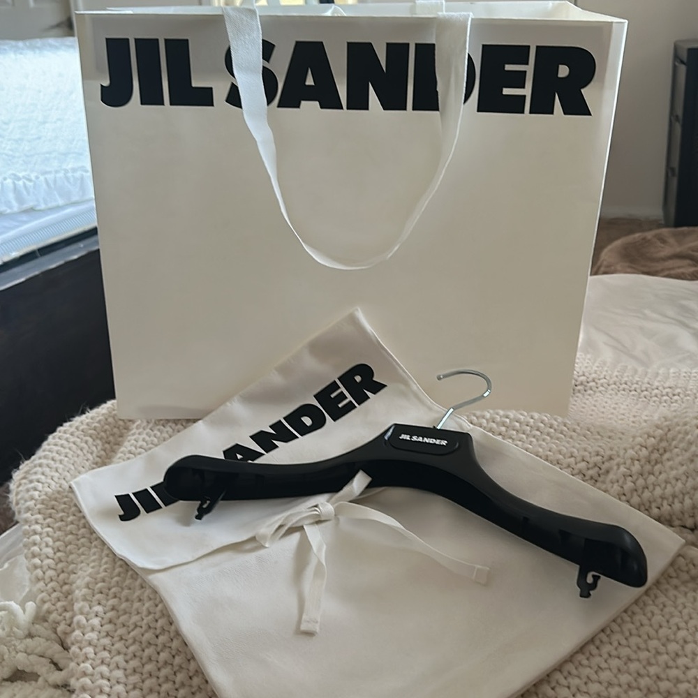 Jil Sander Cream Dust Bag, hanger and shopping bag.